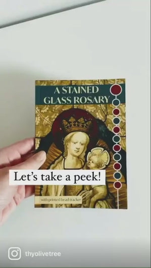 a stained glass rosary book
